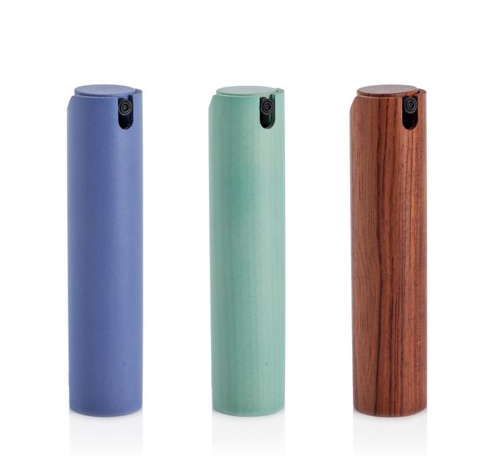 Quadpacks wooden travel perfume packs offer an elegant and sustainable solution